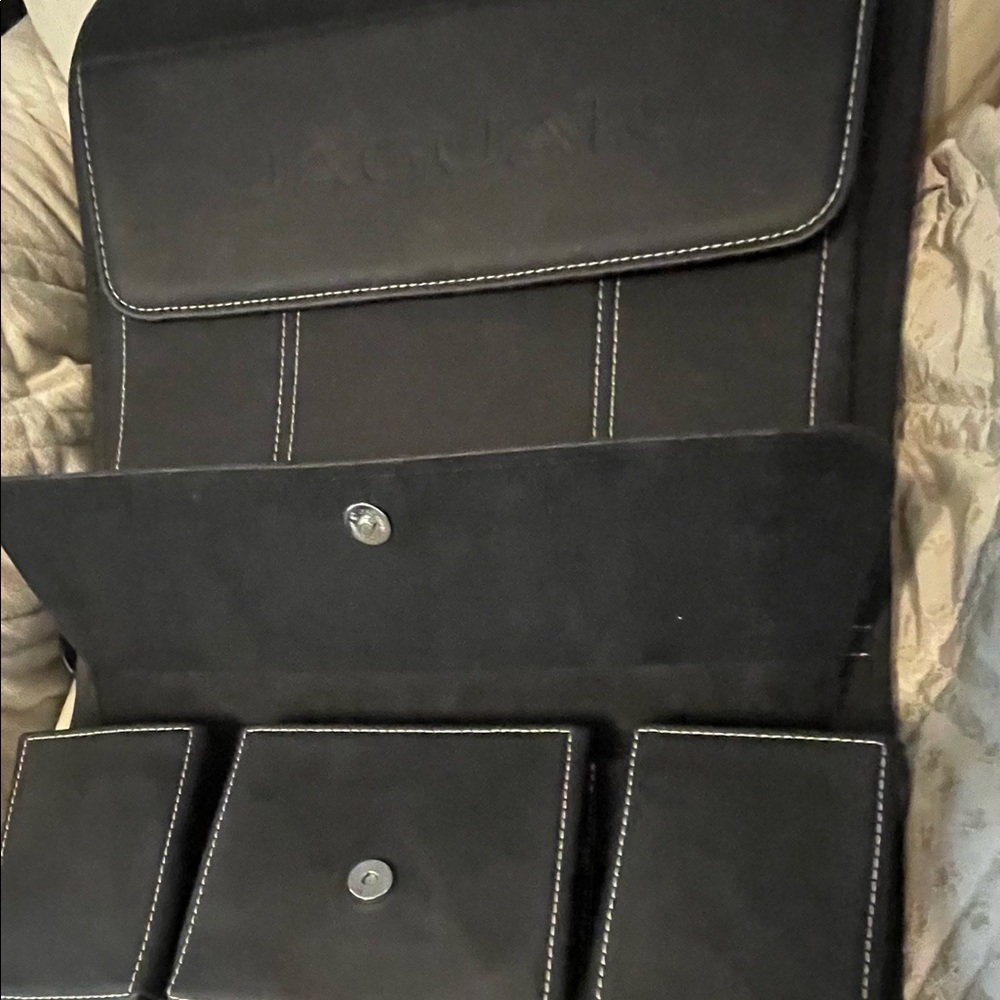 Jaguar , rear seat organizer, leather w/ white stitch detail